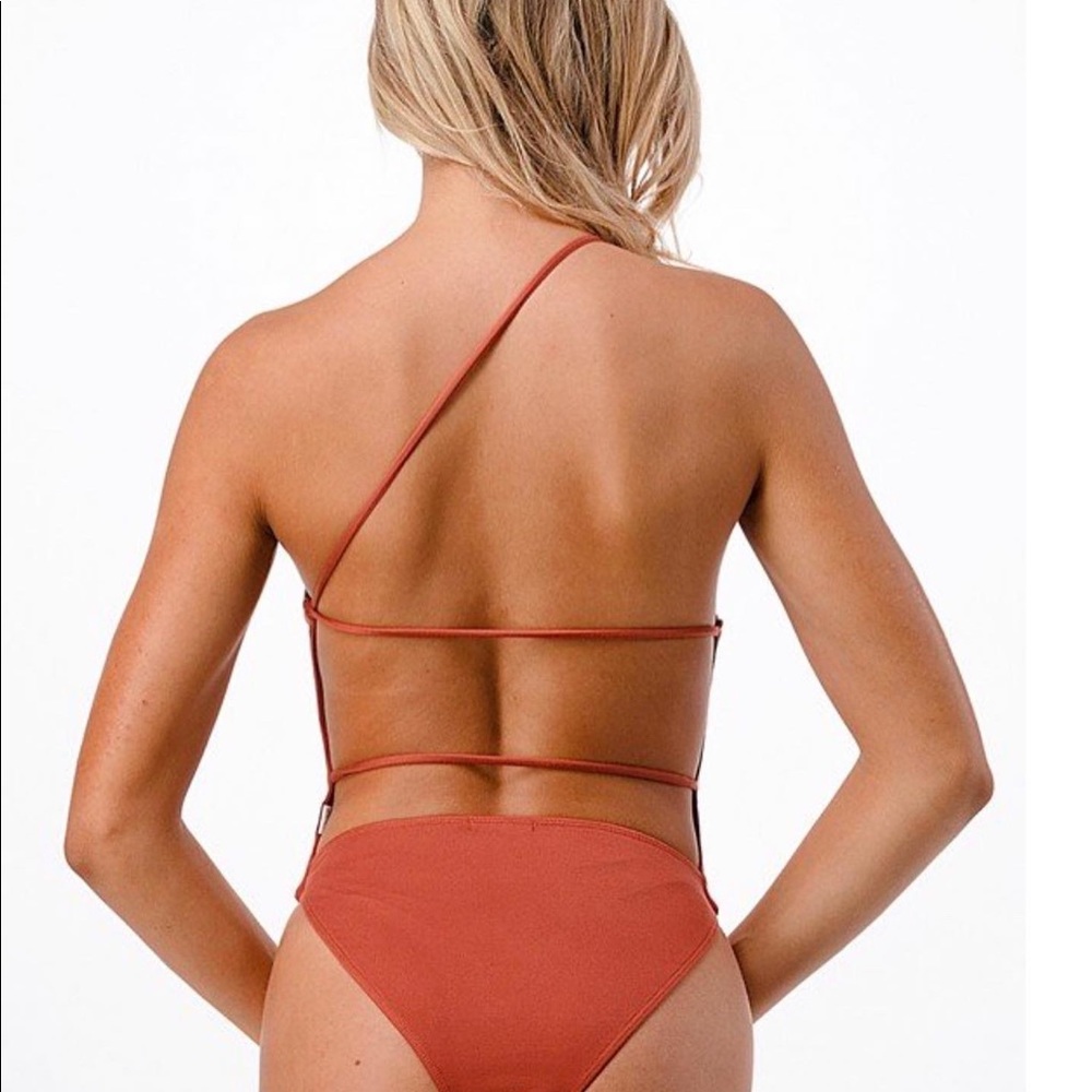 One shoulder orange strappy open back bodysuit